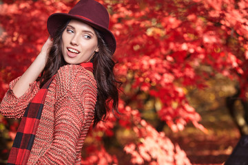 young brunette woman portrait in autumn color