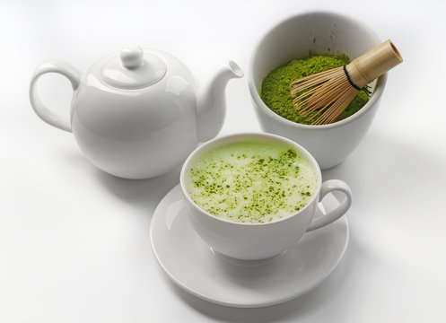 Green matcha tea set on white background