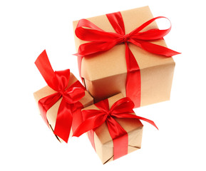 Gift boxes with red ribbon isolated on white