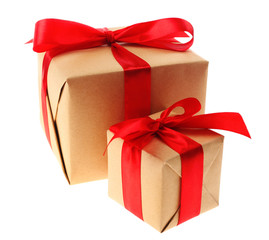 Gift boxes with red ribbon isolated on white