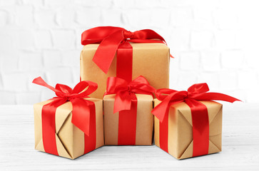 Gift boxes on brick wall background