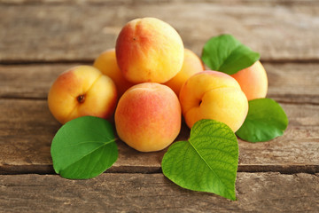 Fresh apricots on wooden table