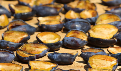 Sun dried blue plum background