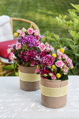 Romantic floral arrangement with roses and carnations