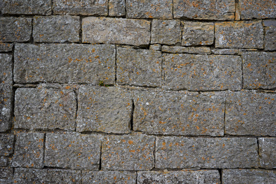 Unshaped stone wall pattern,wall made of rocks with round vignet