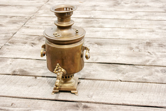 brass samovar on a wooden table
