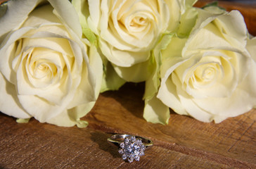 White roses and a ring