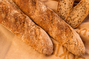 Fresh homemade Alpine Baguettes with seeds and cereal flakes.