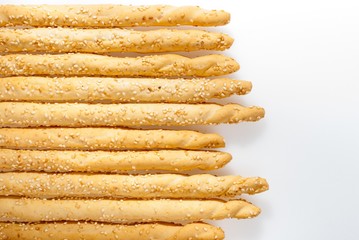 Excellent and natural breadsticks with sesame seeds with them cl