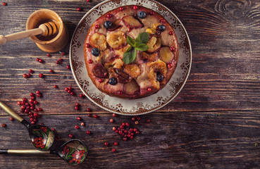 Berry cake with nuts on the table