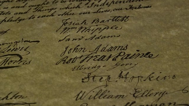 Declaration of Independence by candle light