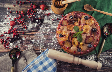 Berry cake with nuts on the table
