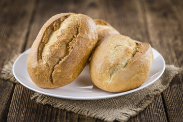 Wooden table with Rolls (selective focus)