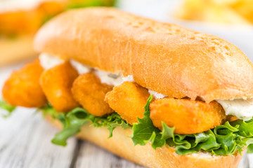 Fish Sticks on a sandwich (close-up shot)