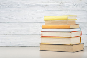Stack of colorful books. Education background. Back to school. Copy space for text.