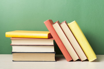 Stack of colorful books. Education background. Back to school. Copy space for text.