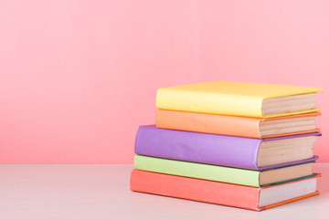 Stack of colorful books. Education background. Back to school. Copy space for text.