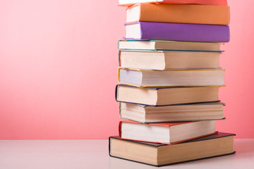Stack of colorful books. Education background. Back to school. Copy space for text.