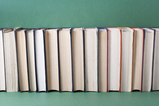 Stack of colorful books. Education background. Back to school. Copy space for text.