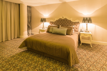 Modern hotel room with big bed