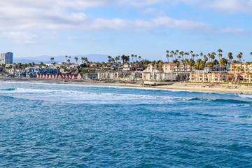 Waves rolling in on the beach in Oceanside, California