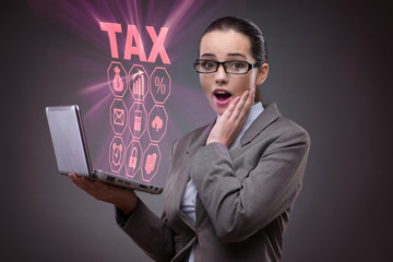 Businesswoman in business tax concept