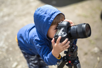 Kid with photo camera