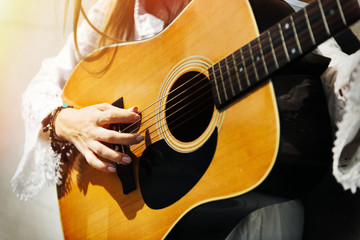 Hippie Woman Playing Music Concept