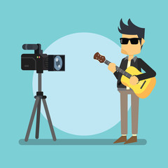 rocker boy holding guitar with camera