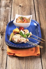 Chicken skewers  and Romesco sauce