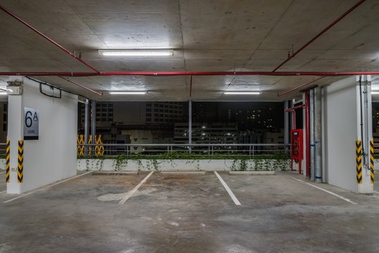 Parking garage interior neon lights at night
