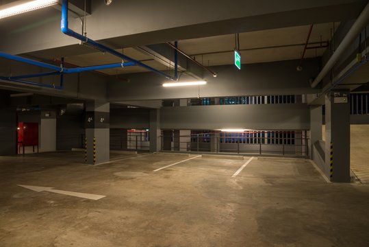 Car parking garage interior warm lights in dark