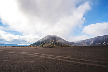 Landscape, Mount Bromo with tyre tracks, adventure concept