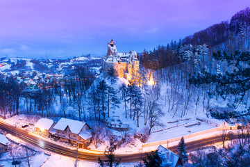 Panoramic view in winter season over Dracula medieval Castle in Bran, Brasov, Transylvania, Romania.