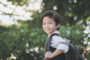 Asian student with backpack