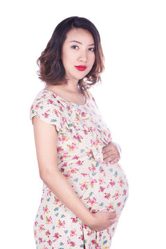 pregnant woman in dress isolated on white background