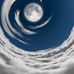 big full moon in a vortex of clouds Elements of this image furnished by NASA