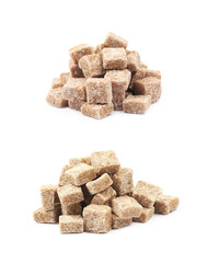 Pile of brown sugar cubes isolated