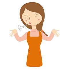 ため息をつくエプロン姿の女性