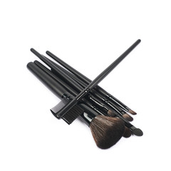 Fototapeta premium Pile of makeup tools and brushed isolated