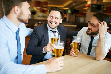 Coworkers Enjoying Beer