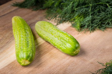 Cucumber with bunch of dill.