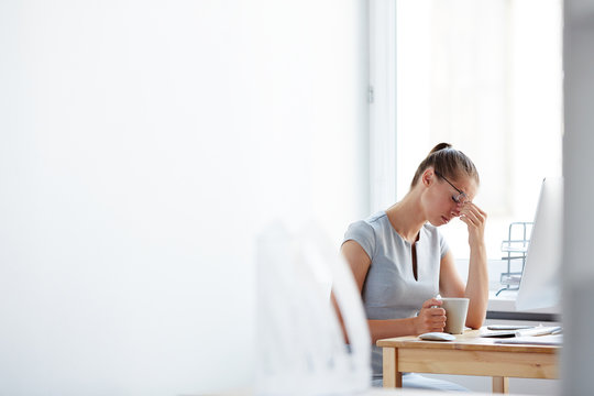 Stressed Young Female in Office