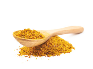 Pile of powdered curry spice isolated