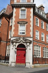Fototapeta na wymiar Red Brick flats in central London