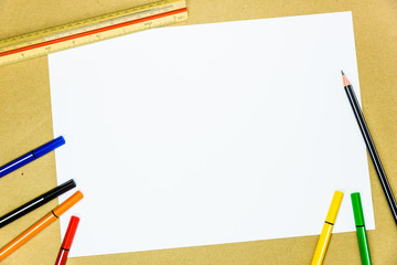 White blank paper with writing tools, copy space for background