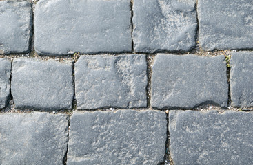 Background of rectangular paving cobblestones of square