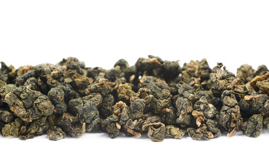 Line of dried green tea isolated
