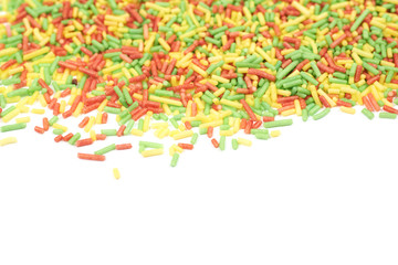 Scattered pile of sprinkles isolated