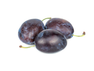 Three fresh plums